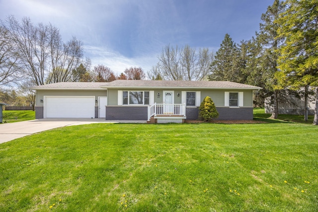 single story home featuring brick siding, a garage, a front yard, and concrete driveway
