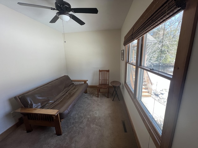 6425 S Taylor Rd, Branch, MI 49402 - sitting room with carpet floors, ceiling fan, baseboards, and visible vents