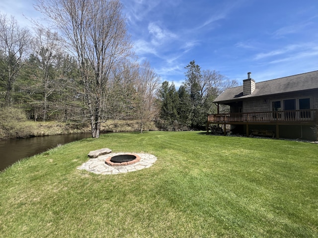 6425 S Taylor Rd, Branch, MI 49402 - view of yard with a fire pit and a deck