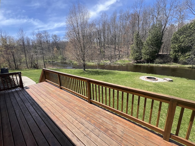 6425 S Taylor Rd, Branch, MI 49402 - wooden deck with a lawn, a water view, and a fire pit
