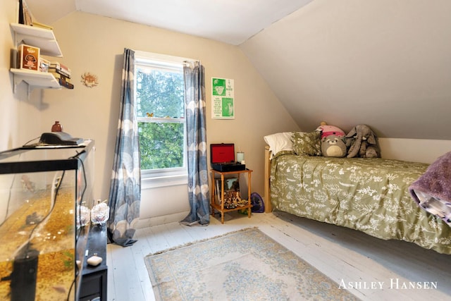 12978 Mason Dr, Grant, MI 49327 - bedroom featuring vaulted ceiling and hardwood / wood-style floors