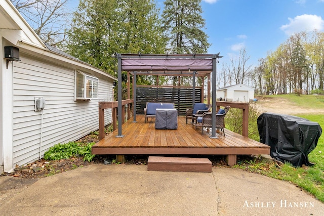 12978 Mason Dr, Grant, MI 49327 - wooden terrace featuring a gazebo and area for grilling