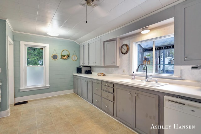 12978 Mason Dr, Grant, MI 49327 - kitchen featuring plenty of natural light, a sink, dishwasher, and gray cabinetry