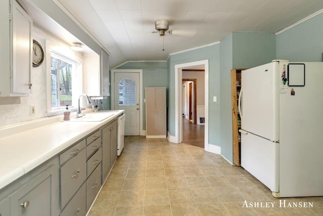 12978 Mason Dr, Grant, MI 49327 - kitchen with gray cabinets, a ceiling fan, crown molding, a sink, and white appliances