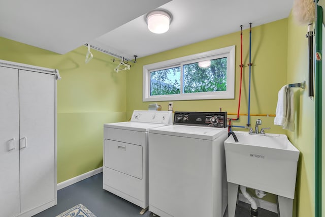 3622 Cushing Ct, Dexter, MI 48130 - laundry area featuring washer and clothes dryer and baseboards