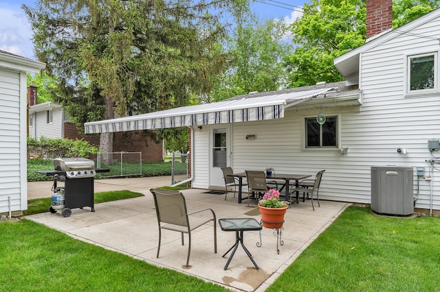 3622 Cushing Ct, Dexter, MI 48130 - view of patio featuring central air condition unit and grilling area