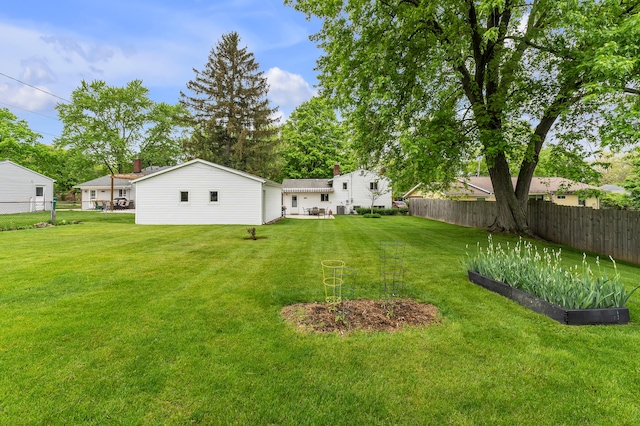 3622 Cushing Ct, Dexter, MI 48130 - view of yard featuring a vegetable garden