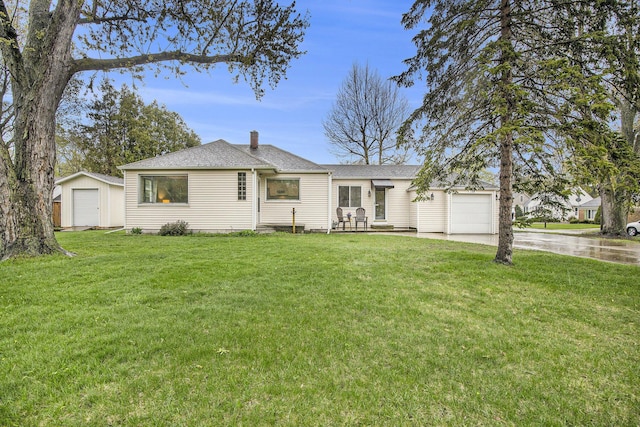 ranch-style home with a garage, a front lawn, a shed, a chimney, and concrete driveway