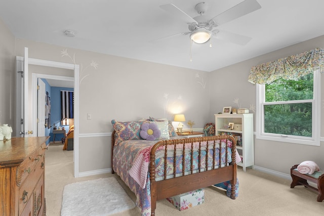 326 Greentree Ln NE, Ada, MI 49301 - bedroom featuring light carpet, baseboards, and a ceiling fan