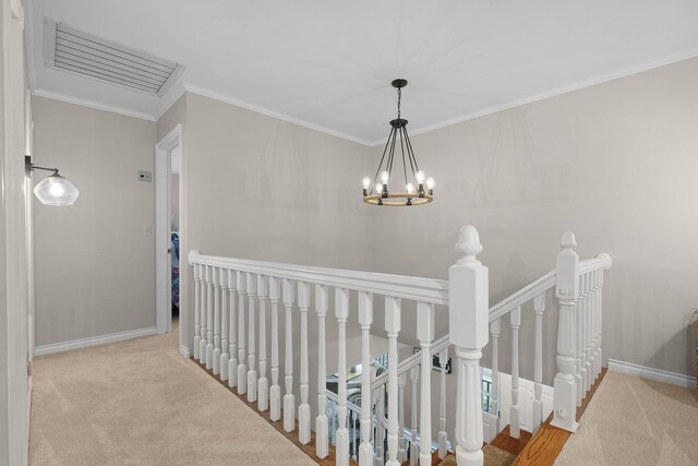 326 Greentree Ln NE, Ada, MI 49301 - hallway featuring an upstairs landing, carpet, crown molding, and baseboards