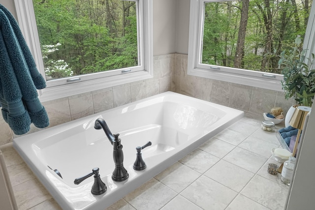 326 Greentree Ln NE, Ada, MI 49301 - bathroom with a garden tub and tile patterned floors
