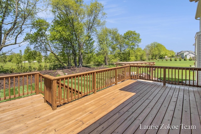 1791 Gloryfield Dr, Byron Center, MI 49315 - wooden deck with a lawn