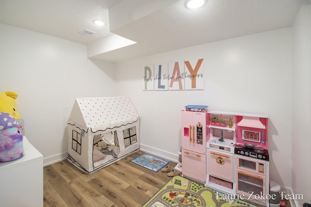 1791 Gloryfield Dr, Byron Center, MI 49315 - game room featuring wood finished floors, recessed lighting, and baseboards