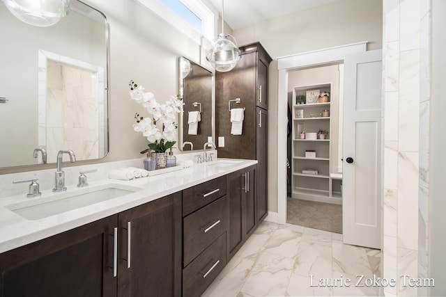 1791 Gloryfield Dr, Byron Center, MI 49315 - full bathroom featuring marble look tile flooring and double vanity