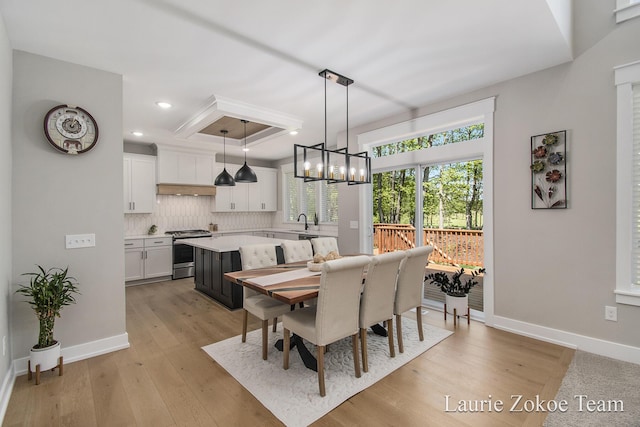 1791 Gloryfield Dr, Byron Center, MI 49315 - dining room with a chandelier, light wood-type flooring, recessed lighting, and baseboards