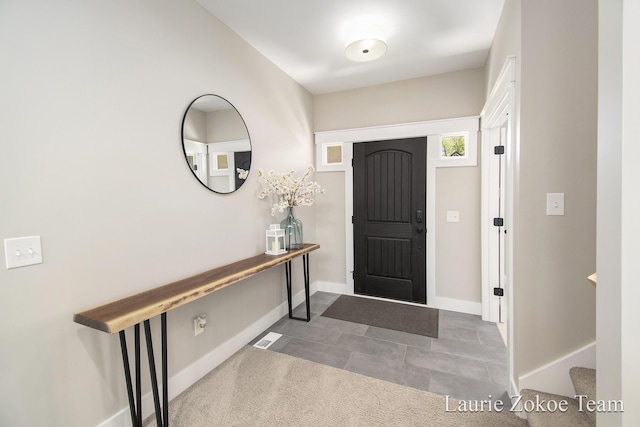 1791 Gloryfield Dr, Byron Center, MI 49315 - foyer entrance featuring baseboards and stairway