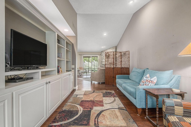 4289 Millpond Dr NE, Rockford, MI 49341 - living area with wood finished floors, vaulted ceiling, and recessed lighting