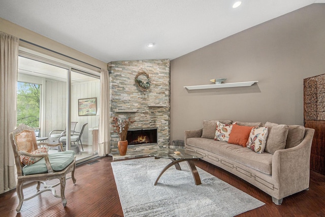 4289 Millpond Dr NE, Rockford, MI 49341 - living area with wood finished floors and a fireplace
