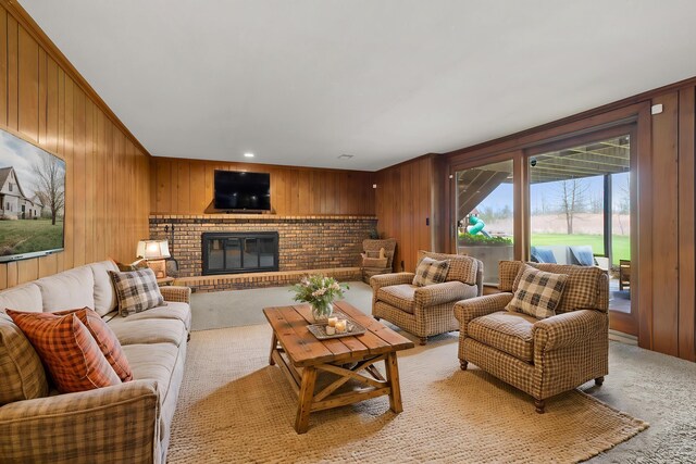 416 Barberry Ave, Portage, MI 49002 - living room with a brick fireplace, wooden walls, and light carpet