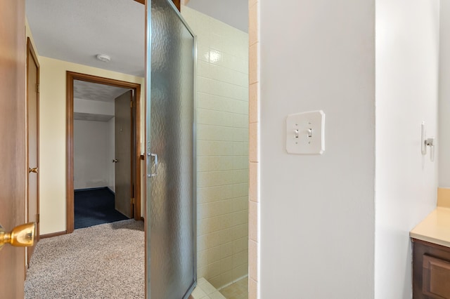 416 Barberry Ave, Portage, MI 49002 - bathroom featuring baseboards, a stall shower, and vanity