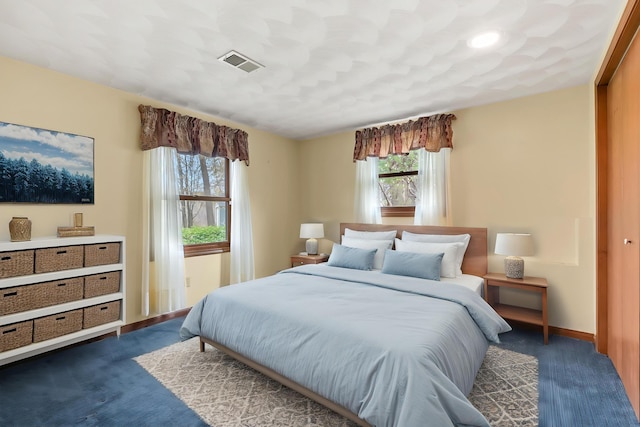 416 Barberry Ave, Portage, MI 49002 - bedroom with visible vents and baseboards