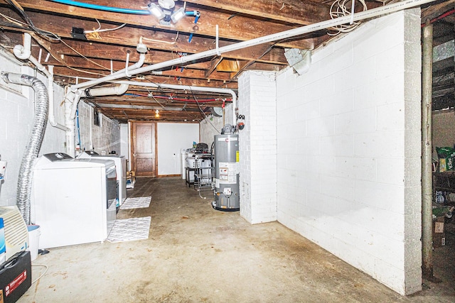 unfinished basement with separate washer and dryer and water heater