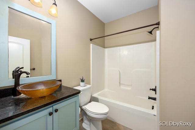 bathroom with toilet, bathing tub / shower combination, and vanity