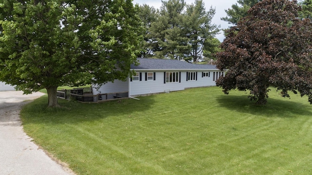 53240 Hemlock Lake Rd, Marcellus, MI 49067 - view of front of house with a front lawn and a shingled roof