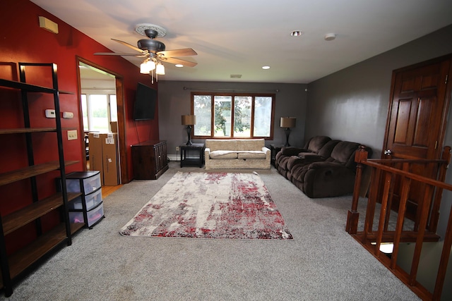 53240 Hemlock Lake Rd, Marcellus, MI 49067 - carpeted living area with healthy amount of natural light, a ceiling fan, a baseboard radiator, and recessed lighting
