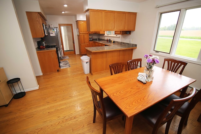 53240 Hemlock Lake Rd, Marcellus, MI 49067 - dining space featuring light wood-type flooring, recessed lighting, and baseboards