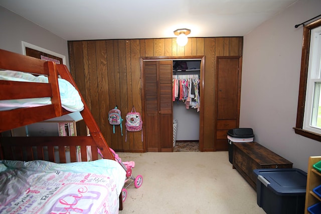 53240 Hemlock Lake Rd, Marcellus, MI 49067 - carpeted bedroom featuring a closet and wooden walls