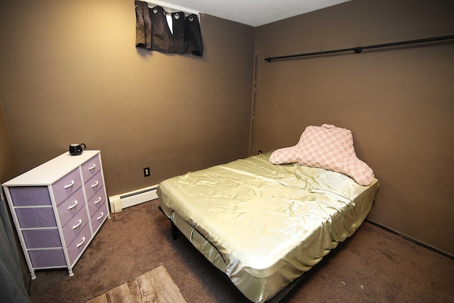 53240 Hemlock Lake Rd, Marcellus, MI 49067 - bedroom with a baseboard heating unit and dark carpet