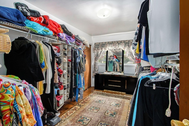 spacious closet featuring wood finished floors