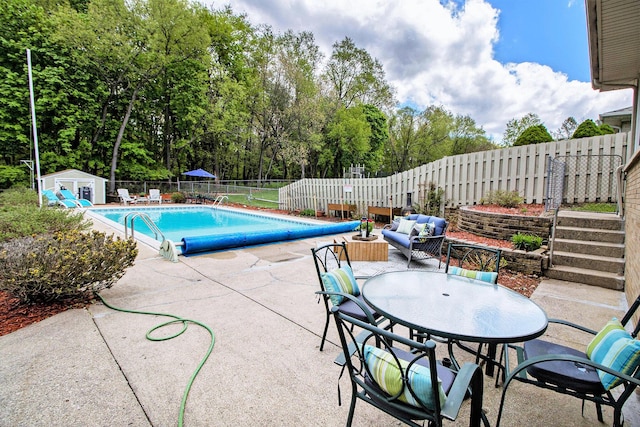 5037 Greenhill St, Portage, MI 49024 - view of swimming pool with a fenced backyard, a patio area, and view of wooded area