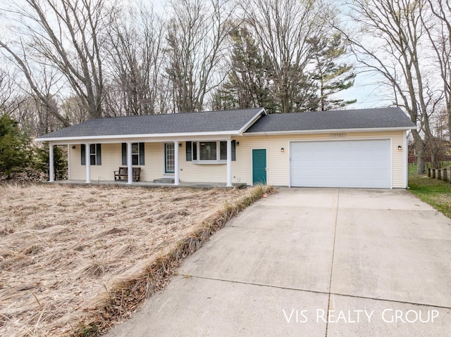ranch-style home featuring an attached garage, concrete driveway, a shingled roof, and a porch