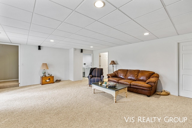 living area featuring washer / dryer, carpet floors, recessed lighting, and a paneled ceiling