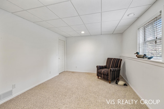 unfurnished room with a paneled ceiling, visible vents, baseboards, carpet, and recessed lighting