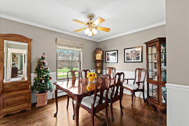 11771 Shenandoah Dr, Green Oak Twp, MI 48178 - dining space featuring a ceiling fan, wood finished floors, and ornamental molding