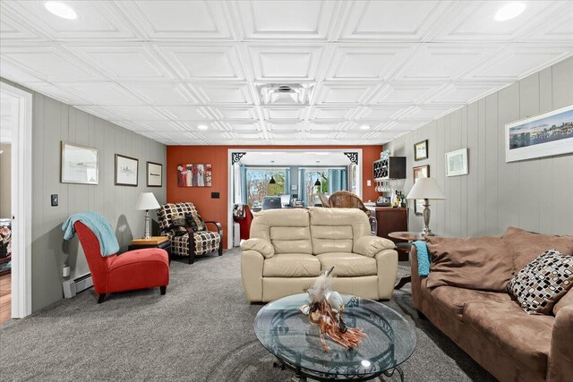 11771 Shenandoah Dr, Green Oak Twp, MI 48178 - living area featuring baseboard heating, carpet floors, an ornate ceiling, and wooden walls