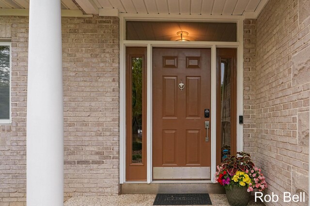 4524 Hidden Ridge Dr, Hudsonville, MI 49426 - property entrance featuring brick siding
