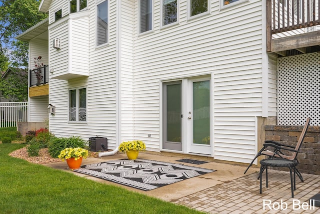 4524 Hidden Ridge Dr, Hudsonville, MI 49426 - back of house with cooling unit and a patio