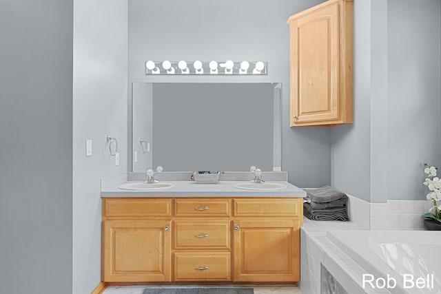 4524 Hidden Ridge Dr, Hudsonville, MI 49426 - full bathroom featuring double vanity and tiled tub
