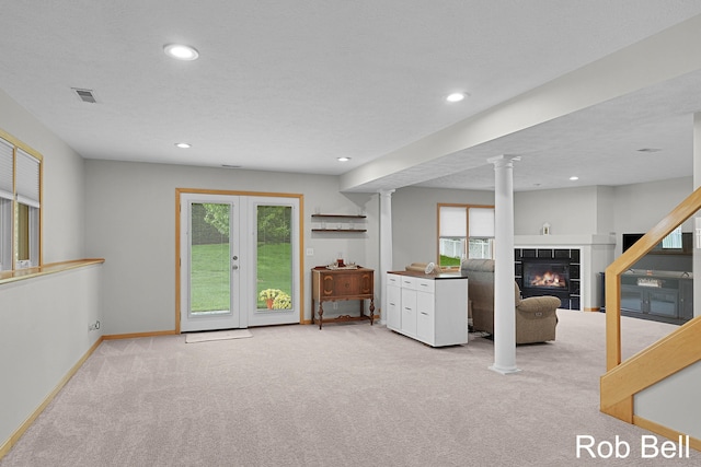 4524 Hidden Ridge Dr, Hudsonville, MI 49426 - living room with carpet, healthy amount of natural light, recessed lighting, ornate columns, and a fireplace