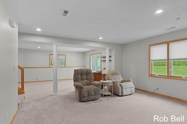 4524 Hidden Ridge Dr, Hudsonville, MI 49426 - living area featuring carpet, baseboards, recessed lighting, and decorative columns