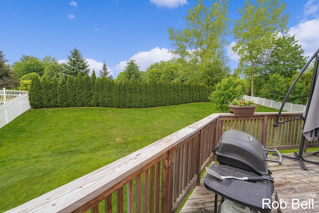 4524 Hidden Ridge Dr, Hudsonville, MI 49426 - wooden deck with a grill