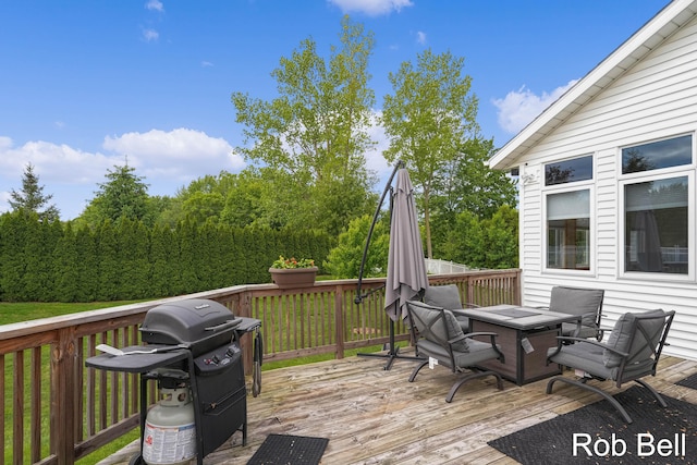 4524 Hidden Ridge Dr, Hudsonville, MI 49426 - wooden deck with grilling area and an outdoor fire pit
