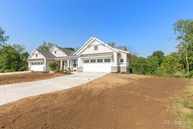 5416 Albright Ave SW Unit 39, Wyoming, MI 49418 - craftsman inspired home featuring board and batten siding, stone siding, a garage, and driveway
