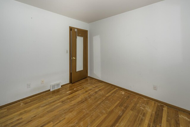 1620 Whittier Rd, Ypsilanti, MI 48197 - unfurnished room featuring wood finished floors and baseboards