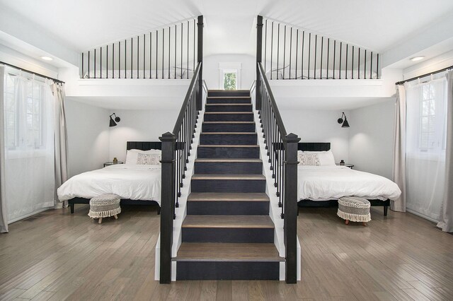 16220 Stones Throw Ln, Union Pier, MI 49129 - bedroom featuring high vaulted ceiling, recessed lighting, and wood finished floors