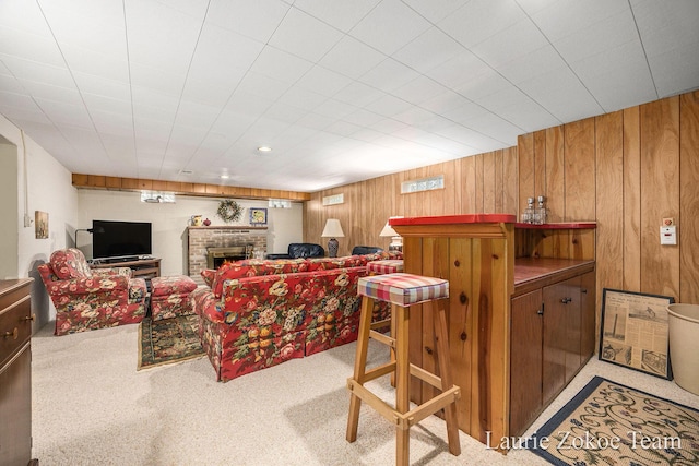 347 Dewitt Ln, Spring Lake, MI 49456 - indoor dry bar with carpet floors, a fireplace, and wooden walls